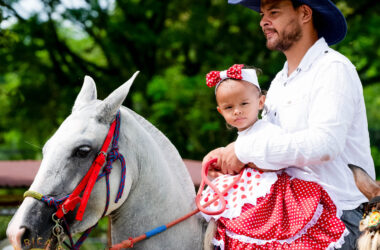 Father and Daughter on horseback in the Independence Day parade Uvita Costa Rica 2025 Padre e hija a caballo en el desfile del Día de la Independencia Uvita Costa Rica 2025